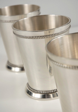 3.25" silver mint julep cups available for $8.50 each.  Plastic mint julep cups are also available in varying sizes with a price range of $2.50-$6.99 each